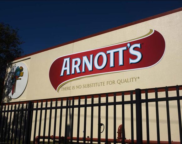 Large sign on the wall of the Arnott's Biscuits distribution centre at Virginia.