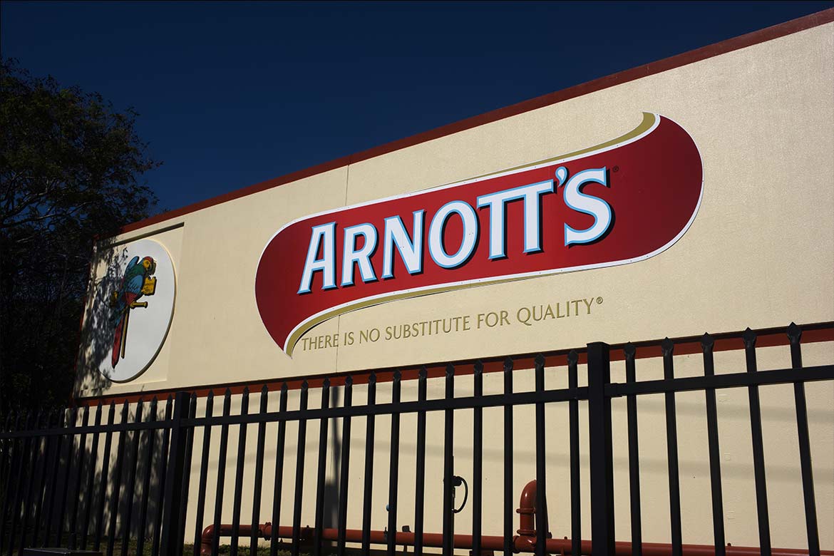 Large sign on the wall of the Arnott's Biscuits distribution centre at Virginia.