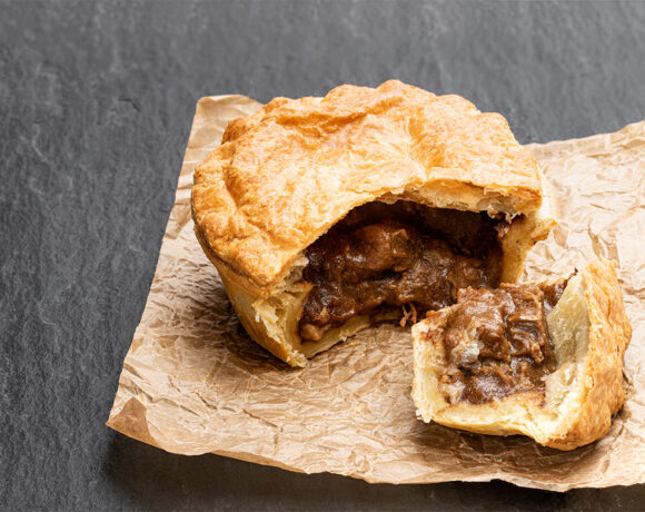 meat pie sitting on a paper bag (Balfours)