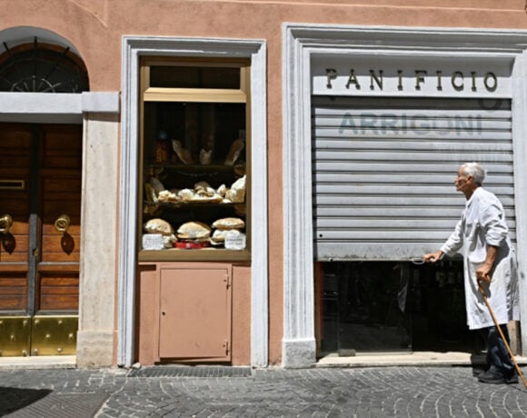 Angelo Arrigoni closes the door of the Panificio Arrigoni. (pope bakery)