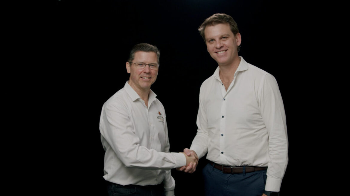 Beefy's Pies CEO Mark Hobbs (left) and RFG CEO Matt Marshall (right) shaking hands