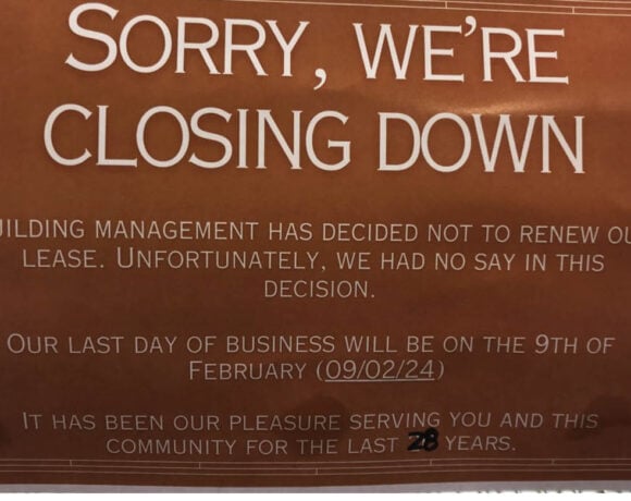 Classic Bakery is displaying a closing down sign.