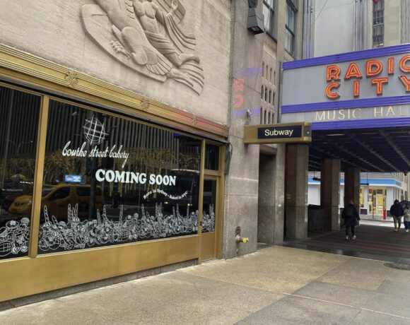 Bourke Street Bakery NYC has announced a new location next to Radio City. Pictured is the window that says coming soon.