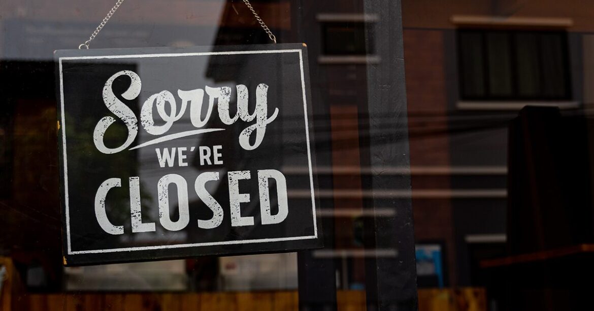 Closed sign on the door of a bakery