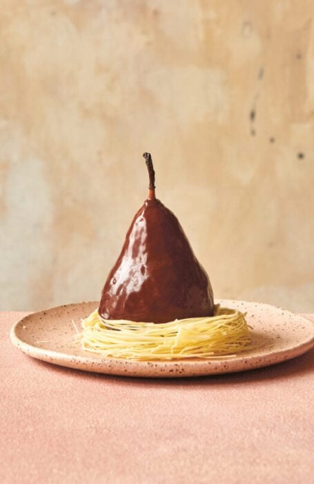 Poached pears with ginger chocolate ganache in white chocolate nests