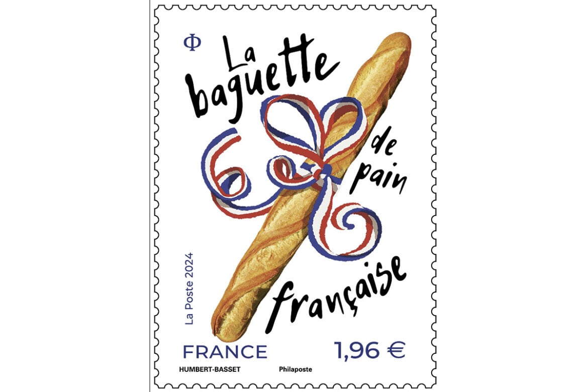 Scratch and sniff baguette stamp. Pictured is the stamp celebrating the baguette. There is cartoon baguette with a red, white and blue ribbon wrapped around it. In black text around the baguette it says La Baguette de Pain Francaise.