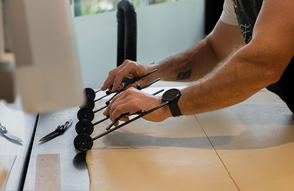 Dough being measured out and cut at Franquette