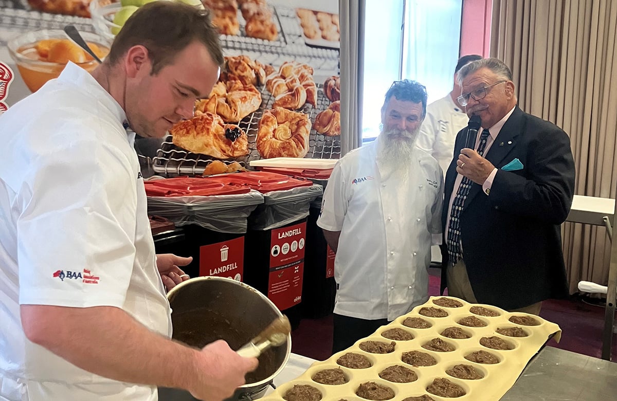 Brad filling the pies during the ANZBake competition