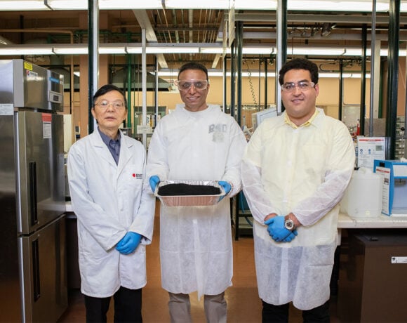 Professor Jie Li, Dr Rajeev Roychand and Dr Mohammad Saberian with the coffee concrete