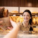 Research has shown personalised "under badges" worn by staff can help reduce customer abuse