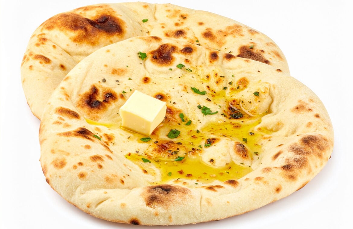 Garlic butter naan has taken out the top spot in TasteAstlas' top 100 breads list