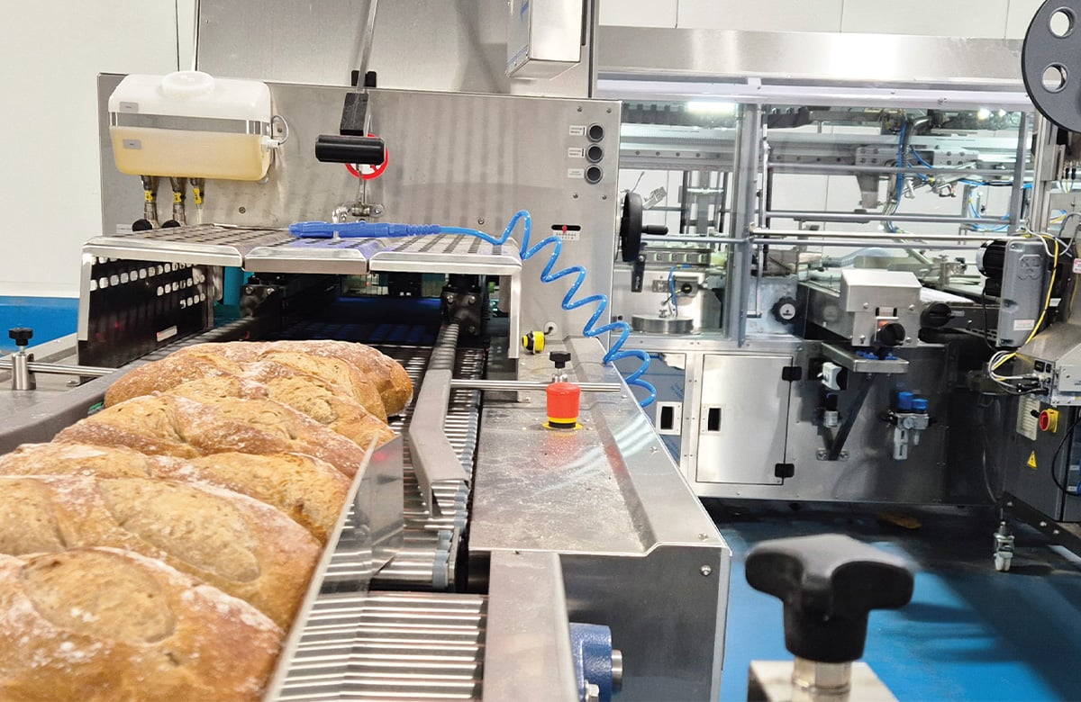 Gavin visits a client’s bakery facility to observe the bread bagging line and explore how UPAC can enhance efficiency with innovative packaging solutions.
