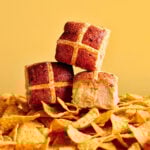 The hot cross bun collaboration includes a savoury cheesy jalapeno variety with Doritos