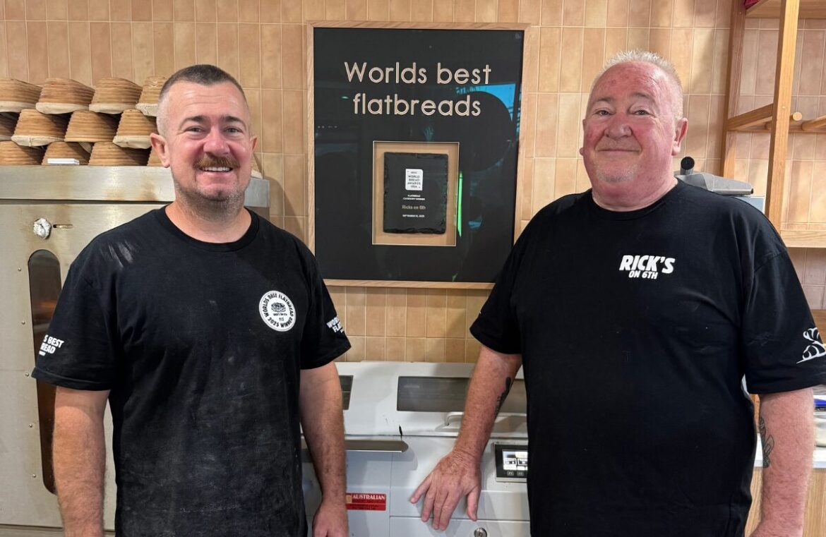 Rick and Graham Martin with their award