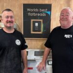 Rick and Graham Martin with their award