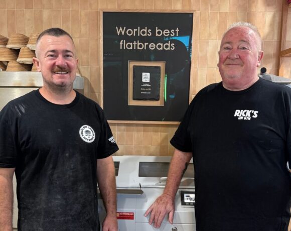 Rick and Graham Martin with their award