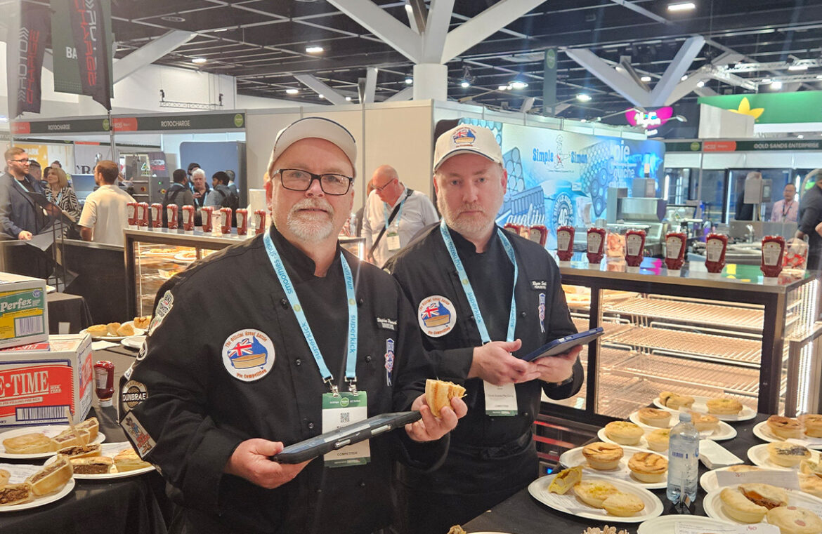Stephen Pinnuck (left) judging at the Official Great Aussie Pie Competition