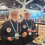 Stephen Pinnuck (left) judging at the Official Great Aussie Pie Competition