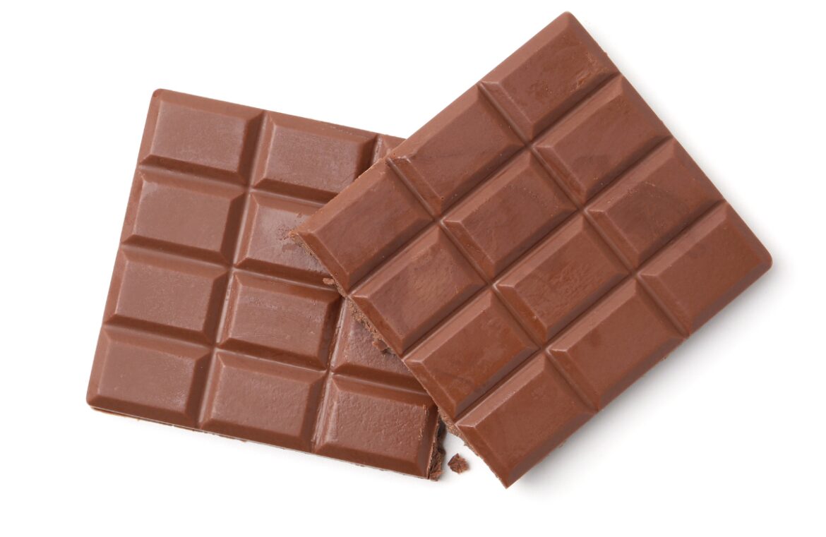 A chocolate bar has been made using 100 per cent British ingredients, including cocoa. Pictured is a large block of chocolate against a white background.