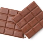 A chocolate bar has been made using 100 per cent British ingredients, including cocoa. Pictured is a large block of chocolate against a white background.