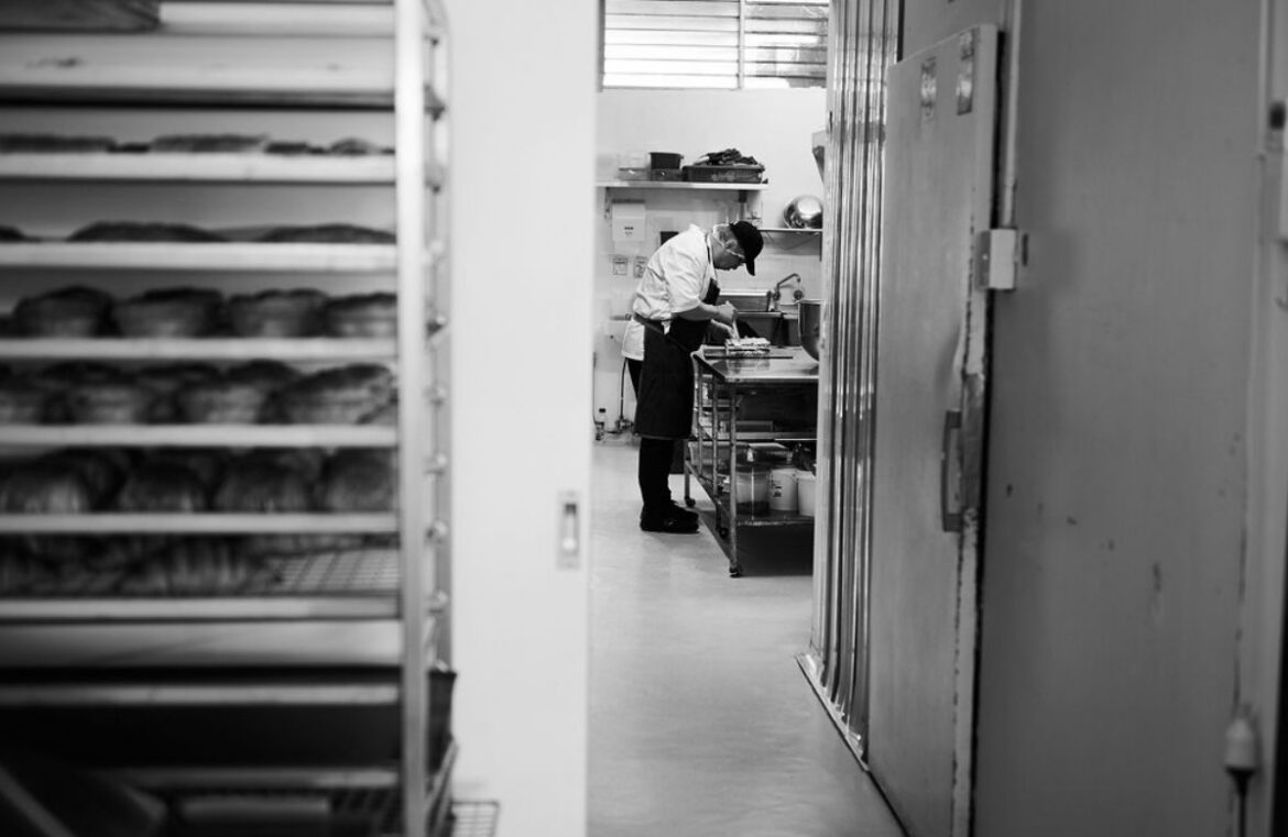 Kun Du baking at Piece of Cake Bakery, which was named Champion Australian Bakery at the Melbourne Royal Food Awards